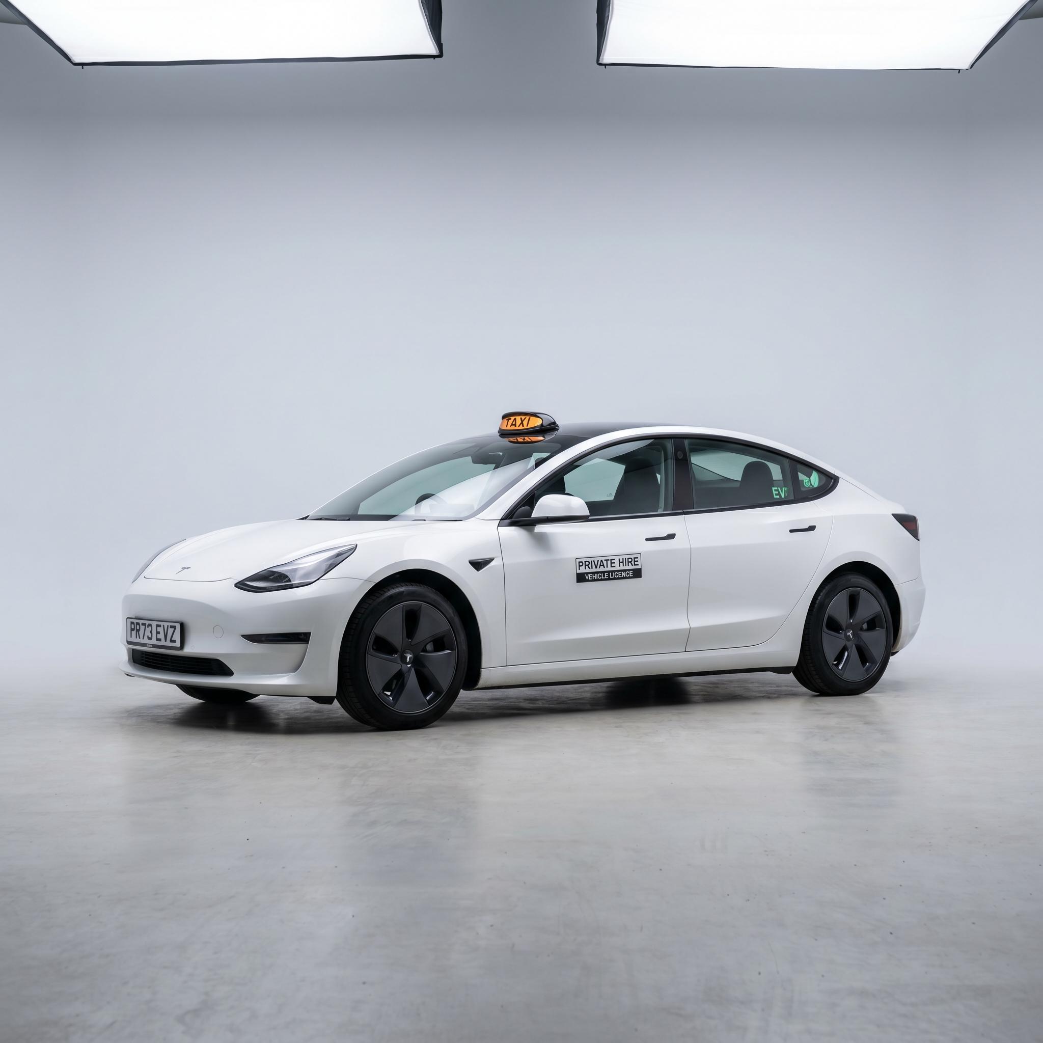 White Tesla Model 3 configured as a UK private-hire EV taxi